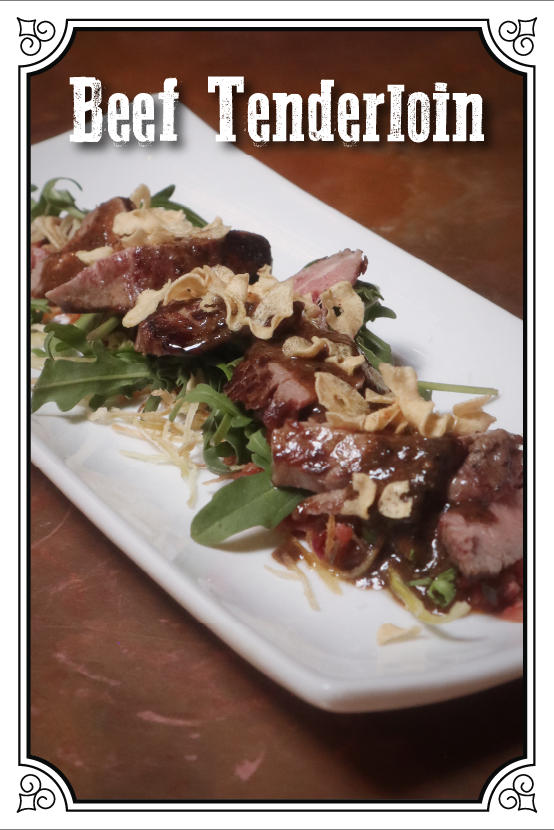 Beef Tenderloin with Arugula, Crisp Garlic and Wasabi-Pepper Butter Sauce  $170.00mxn