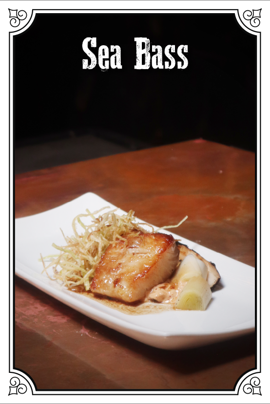 Pan Seared Sea Bass With Roasted And Crisp Leeks, Miso Chili Mayo, And Citrus-Soy-Butter-Truffle Sauce $170.00mxn
